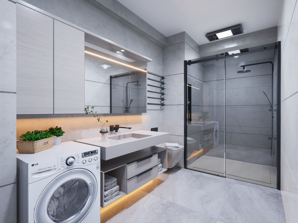 Küçük banyolar için modern tasarım. Cam duşakabin, gri seramik zemin, kompakt çamaşır makinesi. Aydınlık ve ferah banyo iç tasarımı.