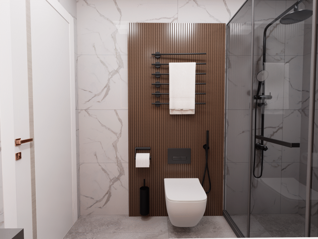 Çağdaş banyo tasarımı, koyu renk mozaik duvar, cam duşakabin, asma klozet, ahşap panel detayları, aydınlatmalı makyaj aynası, akıllı depolama çözümleri. Kullanışlı ve estetik banyo