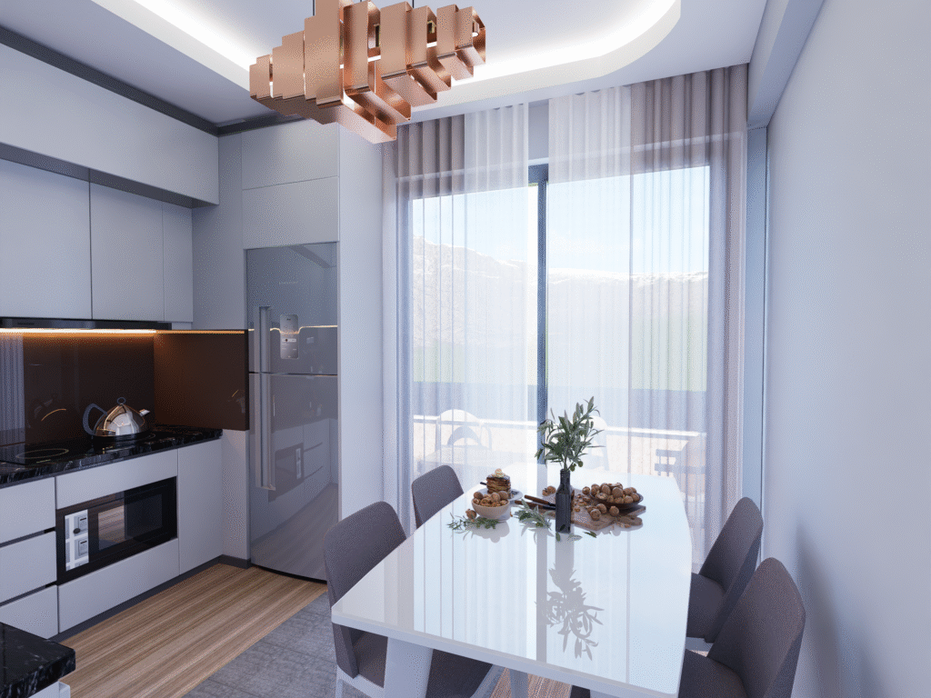 Beyaz ve gri tonlarında tasarlanmış modern bir mutfak ve yemek alanı. Beyaz mermer tezgah ve duvarda yer alan siyah beyaz sanat eseri dikkat çekiyor.