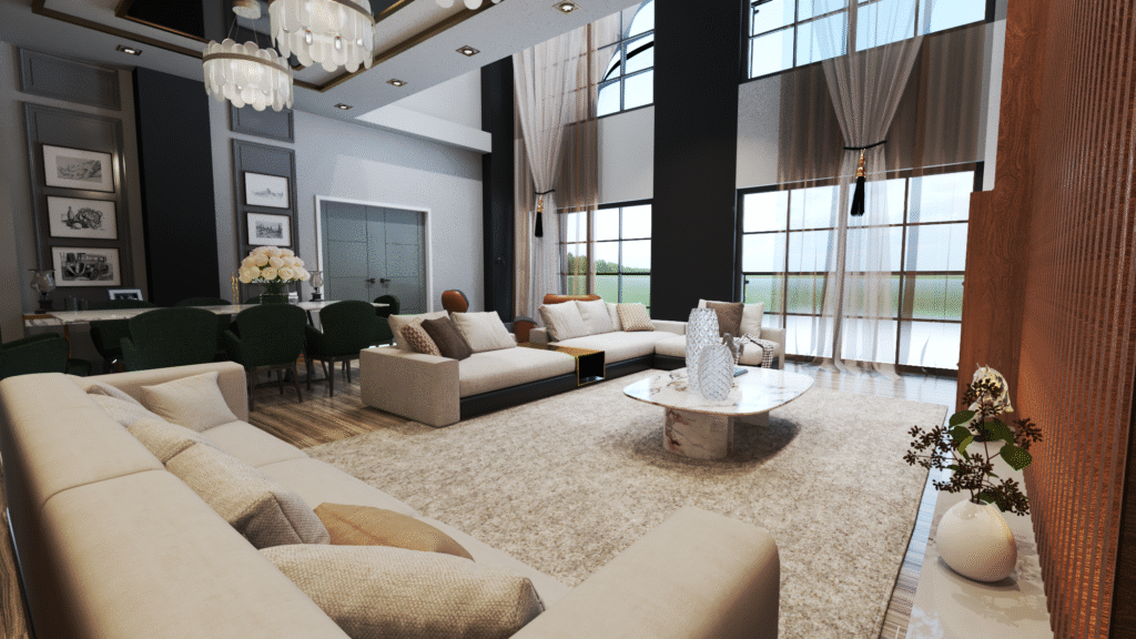 Geniş ve ferah villa salonu, büyük pencereler, bej rengi köşe koltuk takımı, mermer sehpa ve zümrüt yeşili yemek sandalyeleri.