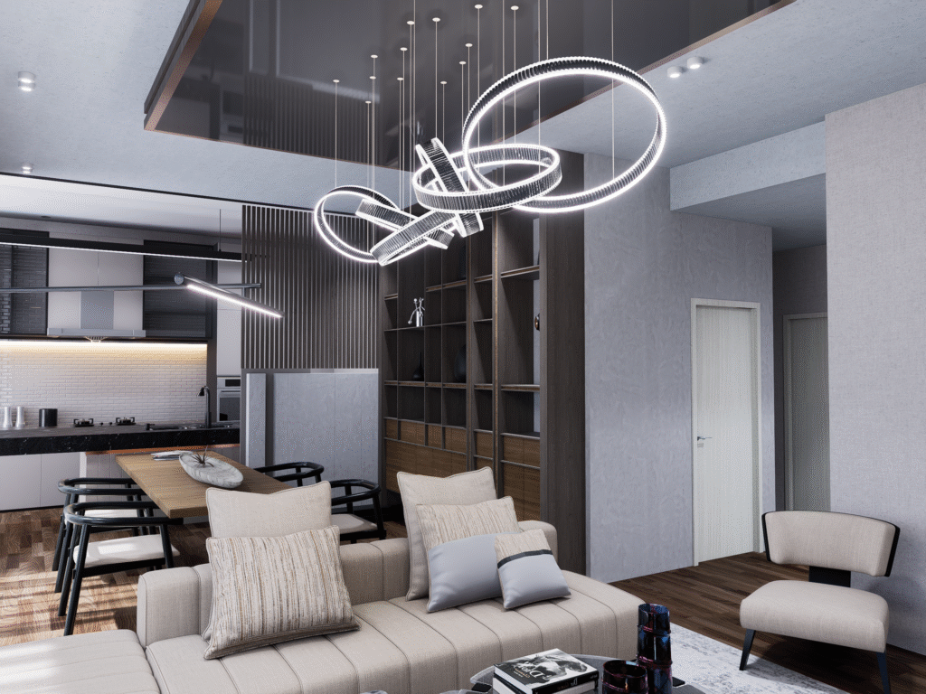 Salon ve Mutfak İç Mimari Tasarımları Lüks ve modern bir villa salonu. Açık bej tonlarda koltuk takımı, soyut bir avize ve TV duvarı görülüyor.